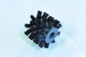 Brosse rotative avec garnissage en crin de cheval