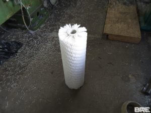 Brosse rotative hélicoïdale à garnissage dense