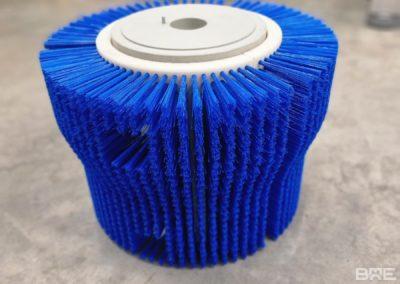 Brosse industrielle pour le nettoyage de bouteilles dans une ligne d'embouteillage